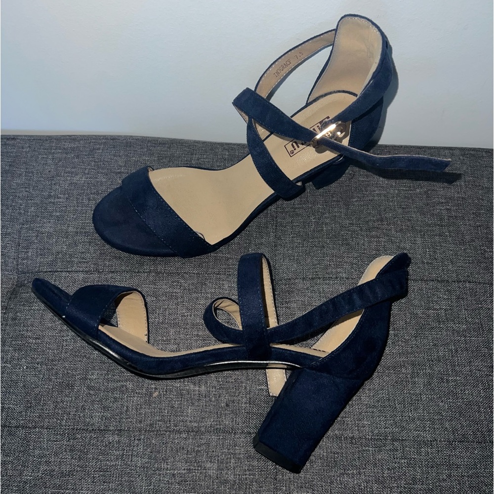 Navy suede open toe heels with ankle strap and buckle